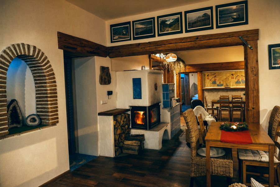 Brick arch with a view of the tiled stove