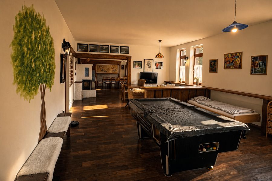 Billiard table and a tree painted on the wall