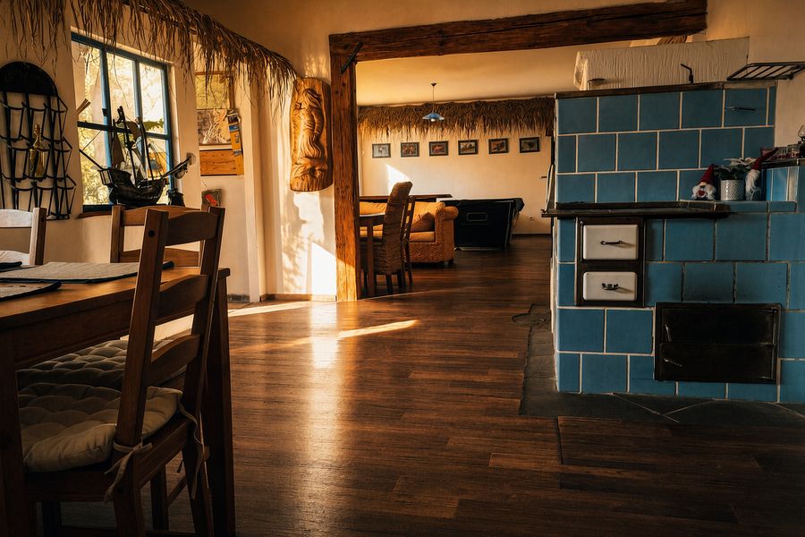 Dining area by the tiled stove